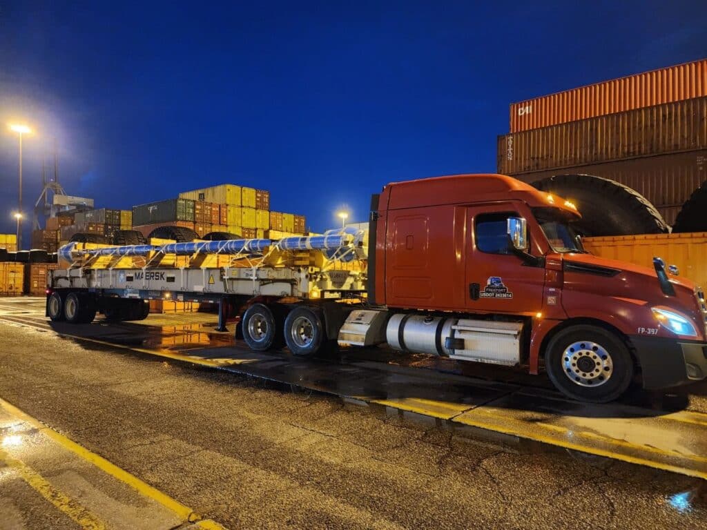 trucking transport with Freeport at night